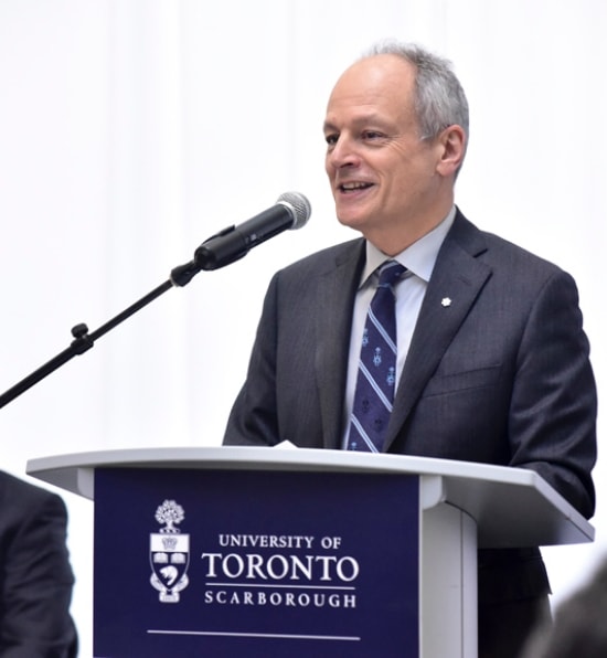 Meric Gertler speaks at a podium. Sign on the podium reads, University of Toronto Scarborough.